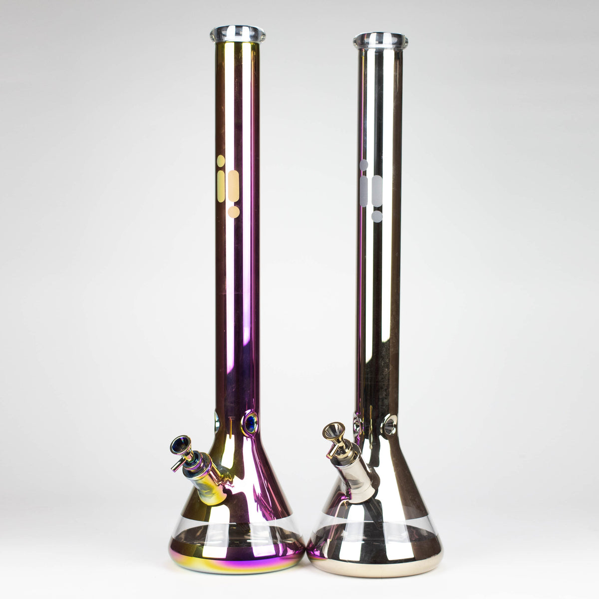 One Purple Iridescent Rainbow and one Gold 24-Inch Infyniti Leaf Metallic Glass Water Bong pictured side-by-side.