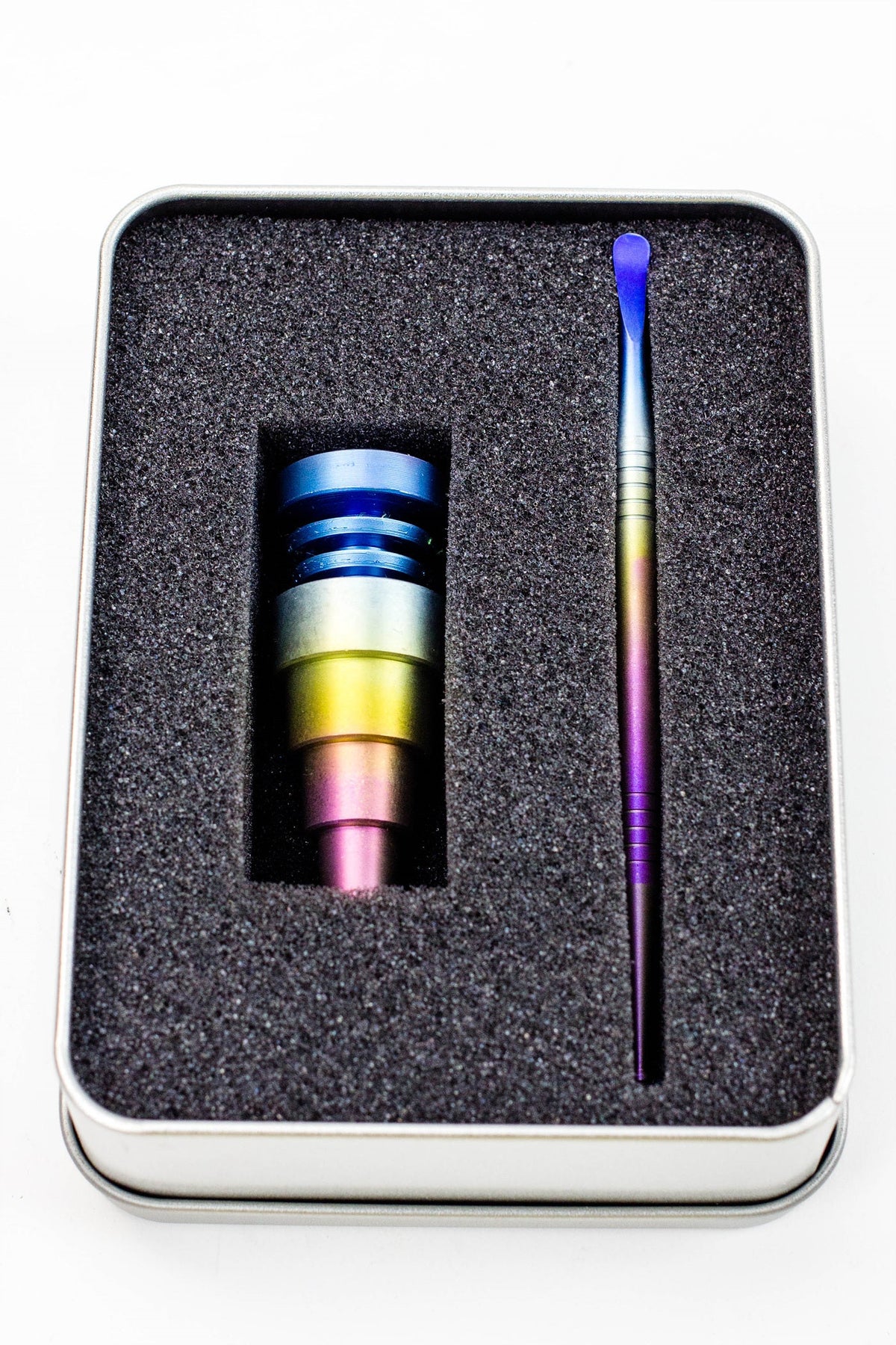 Close-Up of Titanium 6-in-1 Domeless Nail for Dabbing in Rainbow Color In Package