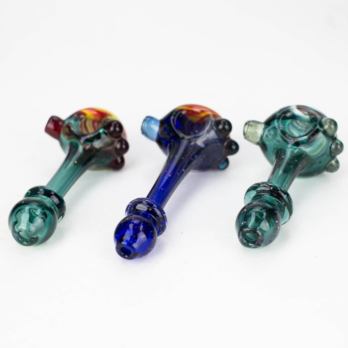 Front View of Three Astral Dust Hand Pipes