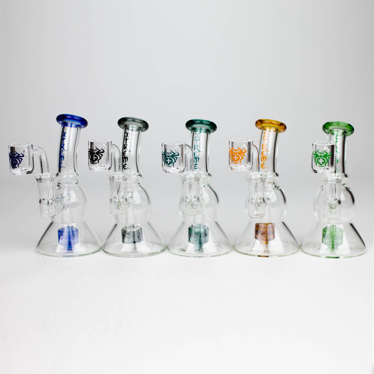 Five 5 Inch Dab Rigs With Showerhead Diffusers from XTREME Glass in different colors