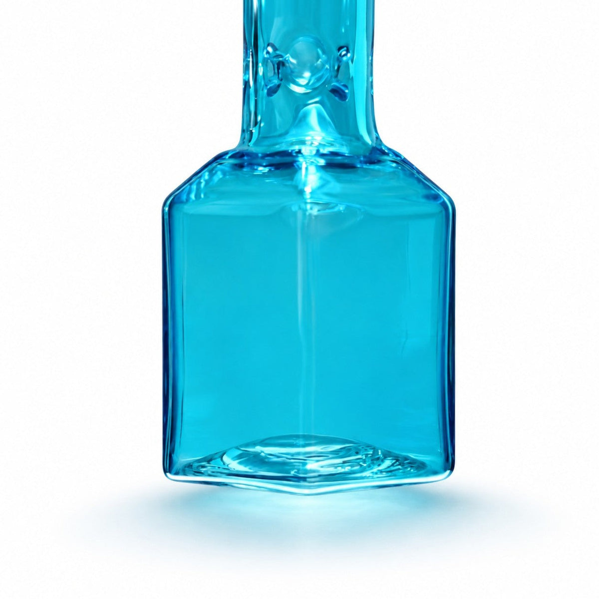 Close-up of the Blue Hex Appeal’s six-sided glass base and its angular shoulder below the neck
