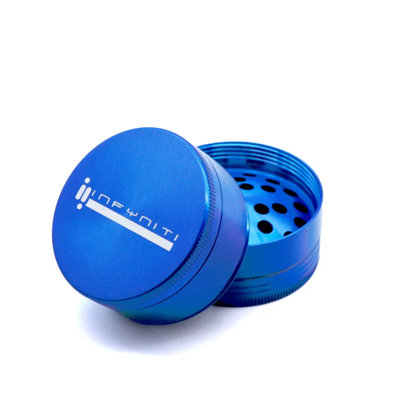 Blue Infyniti GR7557 grinder with its logo lid lifted to reveal the tooth pattern