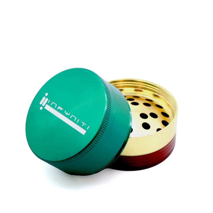 Rasta Infyniti GR7557 grinder with a green lid, yellow grinding section and red lower body