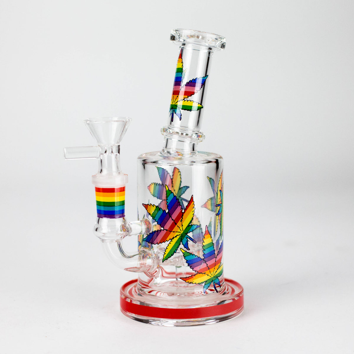 Red-base leaf print hybrid glass rig with rainbow graphics and its herb bowl installed