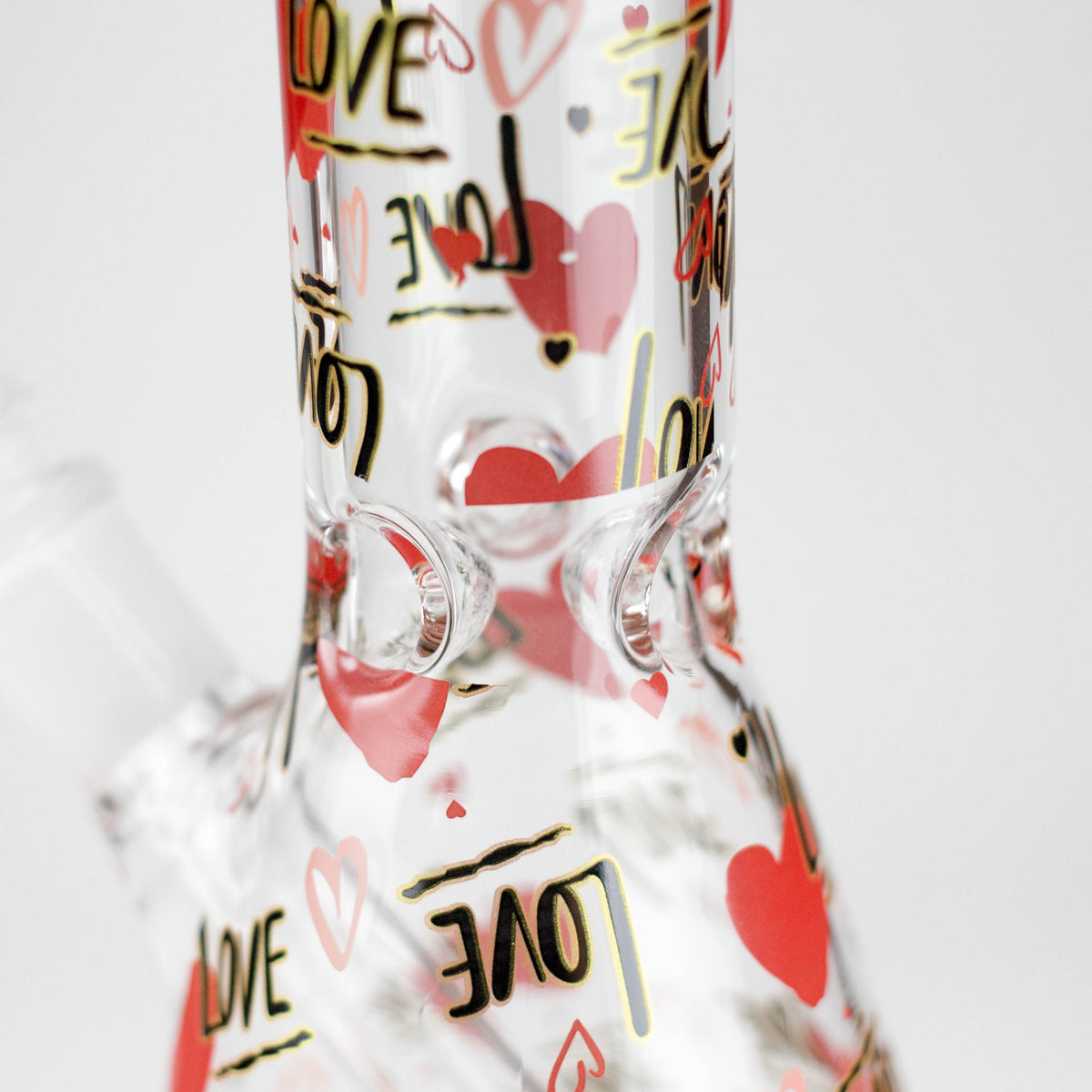 Glass ice pinches below the heart-and-LOVE printed neck of the Love beaker bong