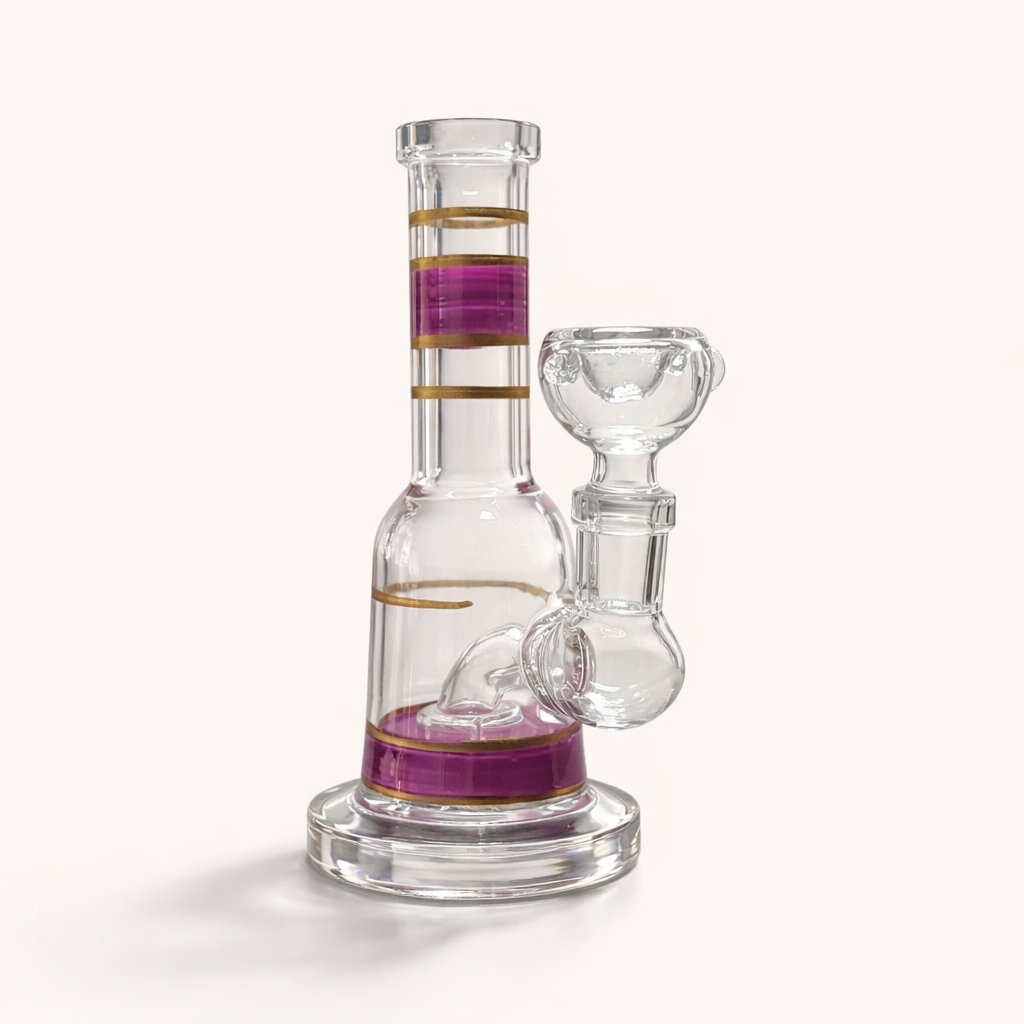 Pink variant of the Mini Crown 6-inch glass bong with pink-purple and gold bands and clear bowl