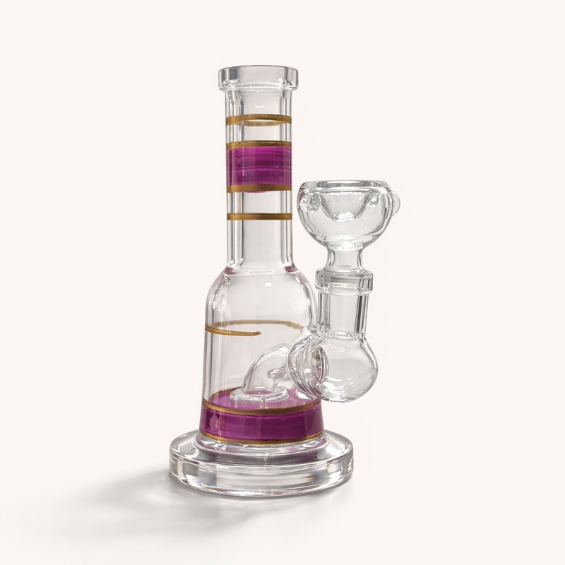 Pink variant of the Mini Crown 6-inch glass bong with pink-purple and gold bands and clear bowl