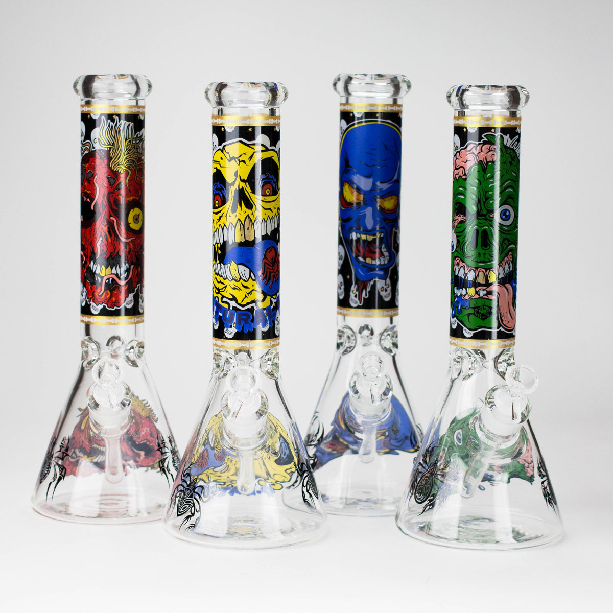 Four 14-inch monster face beaker bongs with red, yellow, blue and green printed artwork