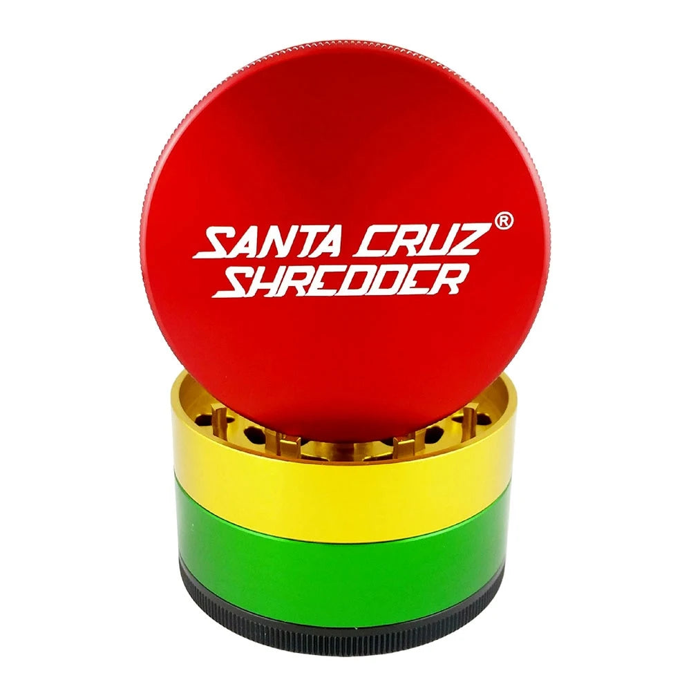 Rasta Santa Cruz Shredder with red lid, yellow grinding chamber, green section and black base