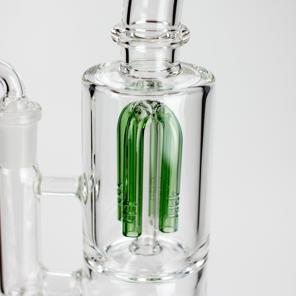 Close-up of the Green Triangle rig’s tree percolator inside the clear glass chamber