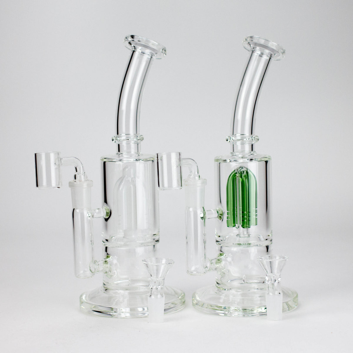 Milk White and Green Triangle tree perc rigs side by side with fitted bangers and separate bowls