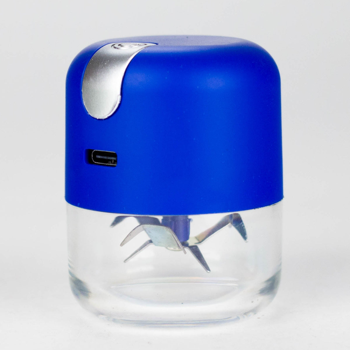 Blue USB rechargeable electric grinder with silver top button and clear grinding chamber