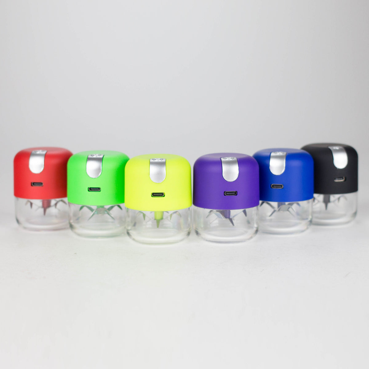 Six USB electric metal grinders in Red, Green, Apple Green, Purple, Blue and Black with clear lower chambers