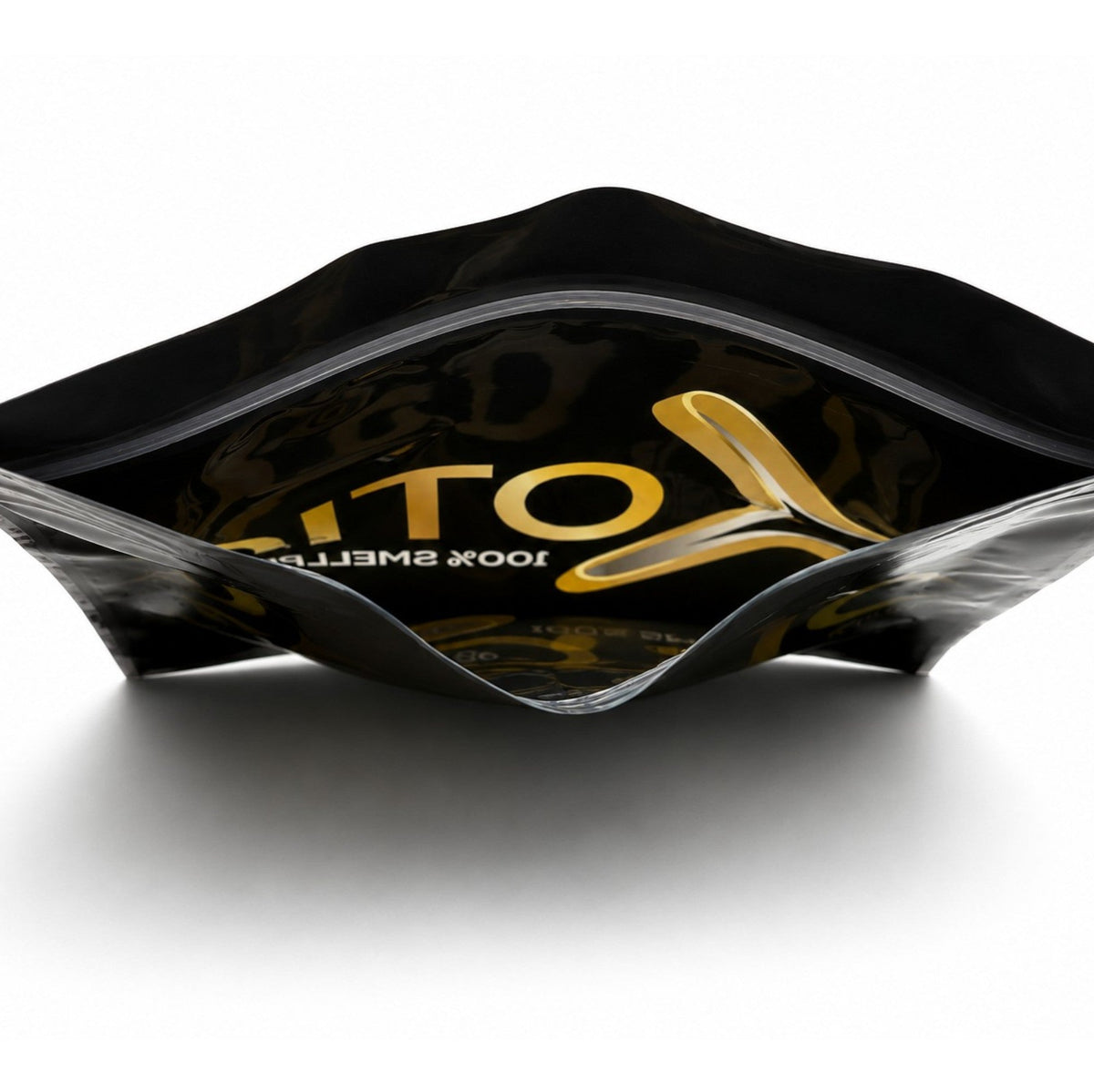 Open Xotic black storage bag showing the resealable zip closure and interior