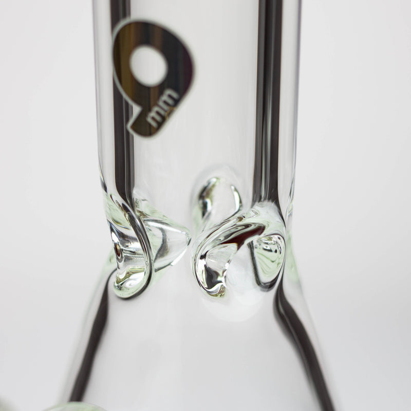 Up-close shot of three-point ice catcher inside 18-Inch Nice Glass Beaker Bong.