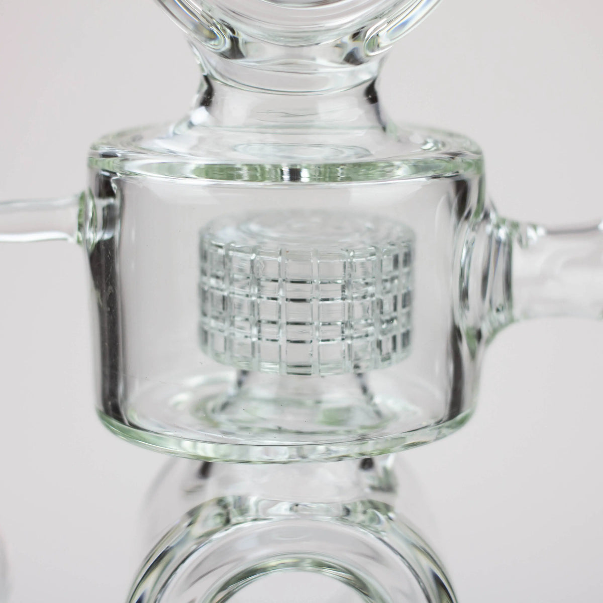 Mesh and Drum Diffuser in the H2O 21-Inch Double Ring Recycler Bong